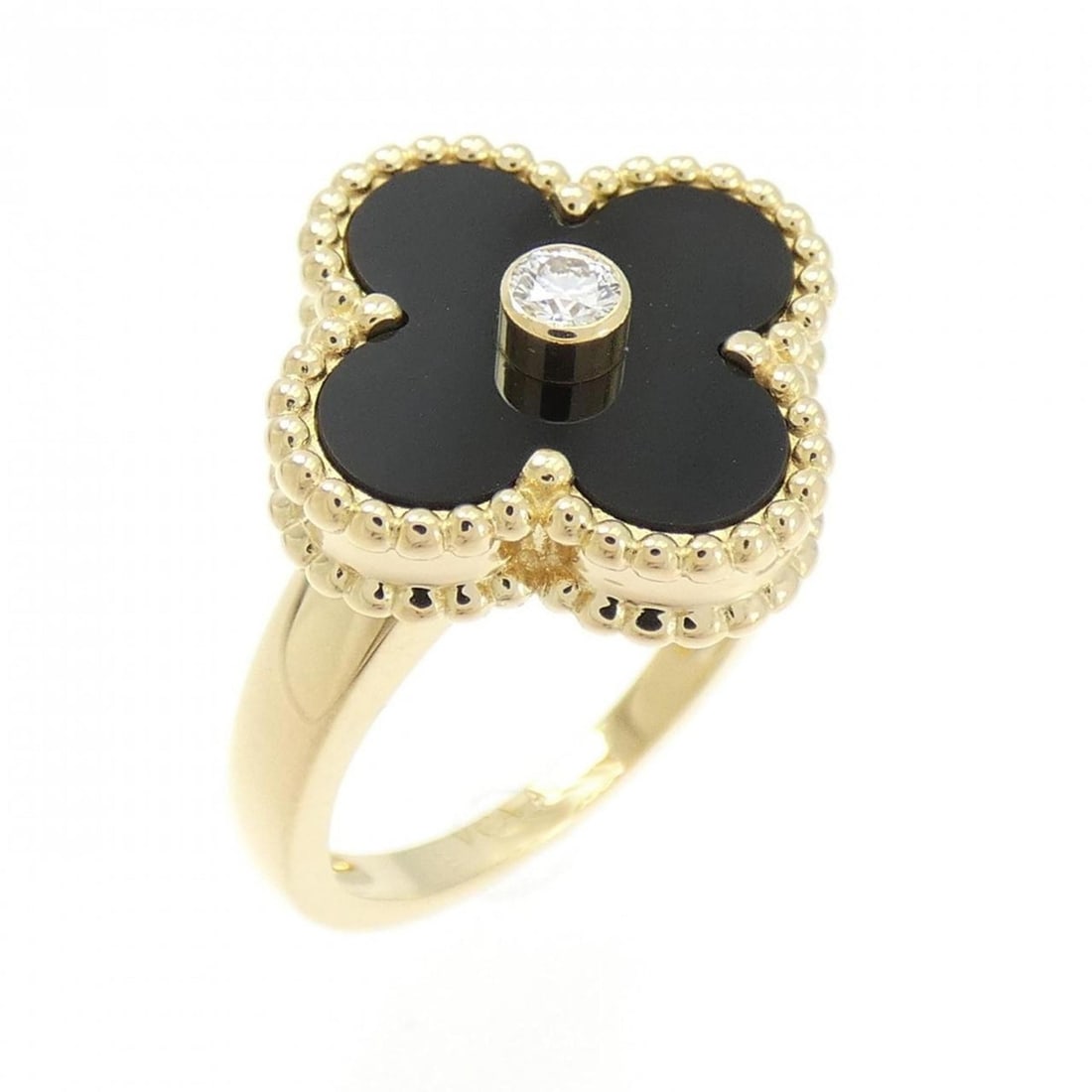 Van Cleef & Arpels Vintage Alhambra Ring: --- Catalog ---Category: SizeUS Size: 4.5Brand Size: 48Category: DesignType: Band ringStone: Diamond, OnyxGender: WomenMaterial: Yellow gold (18K)Category: GeneralMPN: VCARA41000Brand: Van Cleef & Arp