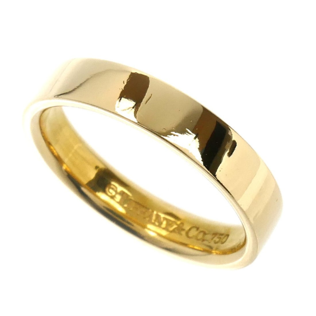 TIFFANY & Co. 18K Yellow Gold Flat Band Ring, 5.6g, Women's: --- Catalog ---Category: SizeUS Size: 7.5Brand Size: 55Category: DesignType: Band ringGender: WomenMaterial: Yellow gold (18K)Category: GeneralBrand: TiffanyCountry of Origin: USA--- Item List ---Sect