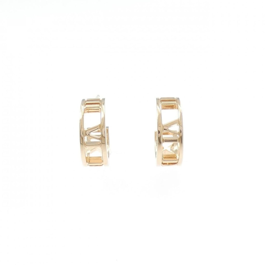 Tiffany Atlas earrings: --- Catalog ---Category: SizeSize (HxWxD): 13.60mm x 4.90mm / 0.54'' x 0.19''Category: DesignType: Half hoop earringsColor: Pink goldGender: WomenMaterial: Pink gold (18K)Category: GeneralBrand: