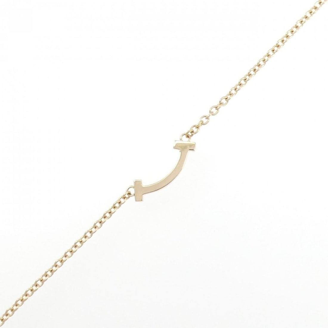 Tiffany T Smile Mini Bracelet: --- Catalog ---Category: SizeLength: 16.5cm / 6.49''Category: DesignType: Charm braceletGender: WomenMaterial: Pink gold (18K)Category: GeneralBrand: Tiffany--- Item List ---Section: ConditionRanking: