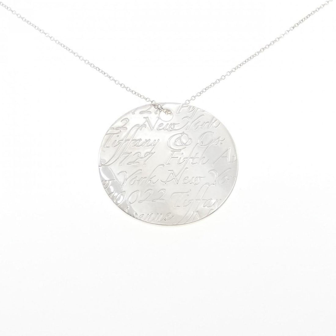 Tiffany Notes Round Large Necklace: --- Catalog ---Category: SizePendant Size: 41.2mm / 1.62''Neck Circumference: 50 cm / 19.68''Category: DesignGender: WomenMaterial: Silver 925Necklace Type: NecklaceCategory: GeneralBrand: Tiffany---