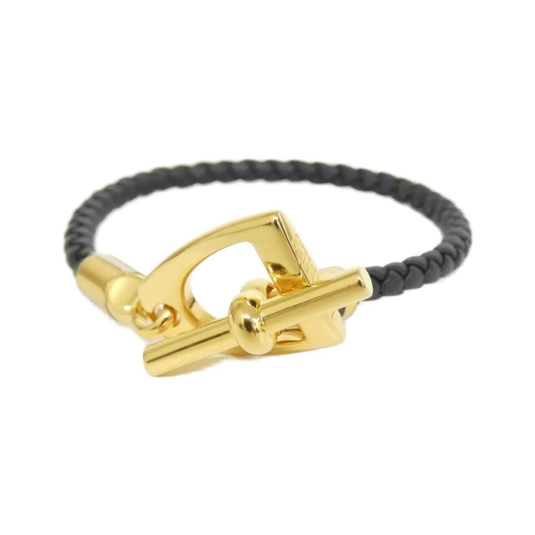 Hermes Etrier 100016F Bracelet: --- Catalog ---Category: SizeLength: 15.5cm / 6.1''Category: DesignType: Charm braceletColor: Black, GoldGender: WomenMaterial: Swift leatherCategory: GeneralMPN: 100016FBrand: Hermes--- Item List