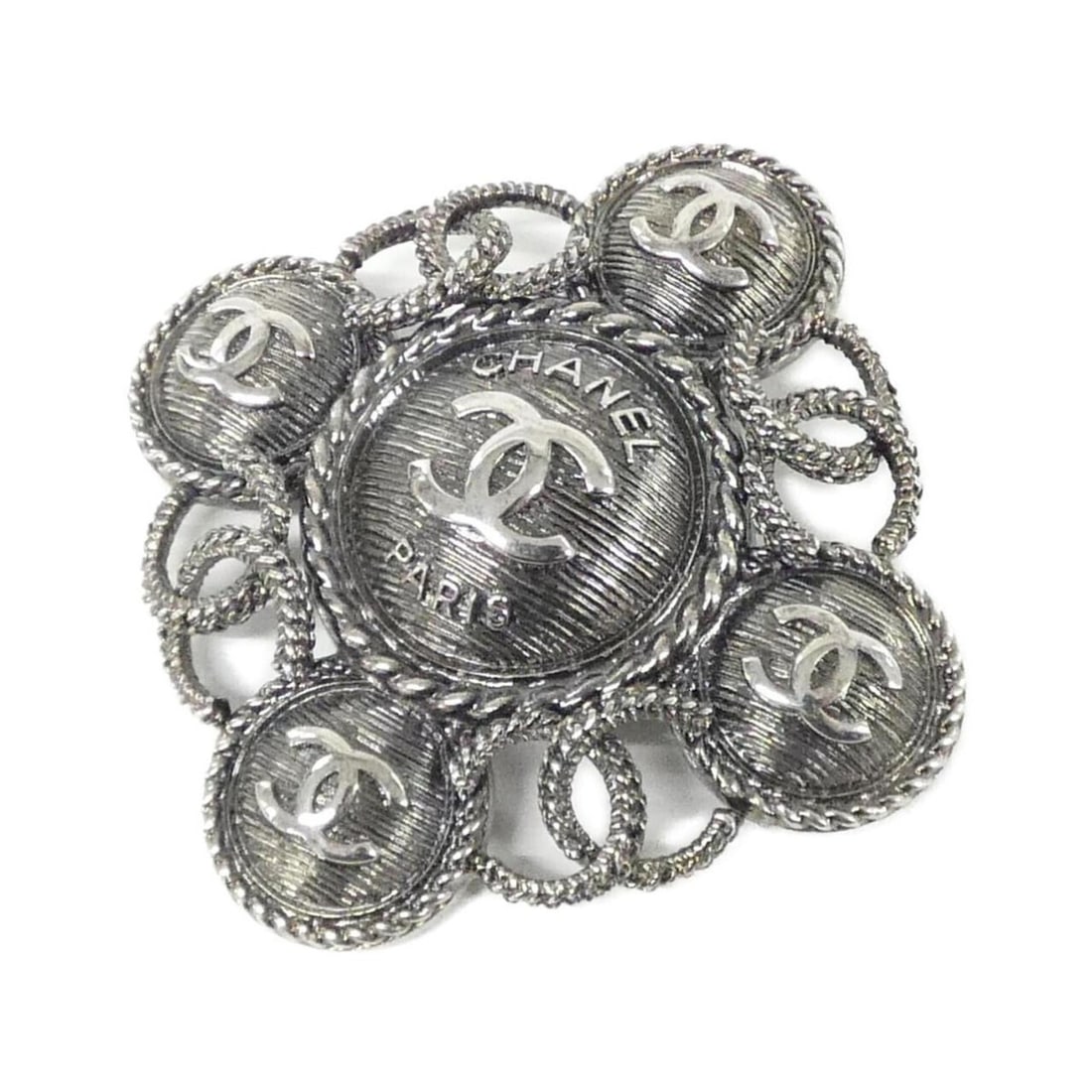 Chanel 58730 Brooch: --- Catalog ---Category: SizeSize (HxWxD): 6cm x 6cm / 2.36'' x 2.36''Category: DesignType: BroochColor: SilverGender: WomenCategory: GeneralMPN: 58730Brand: Chanel--- Item List ---Section: ConditionR