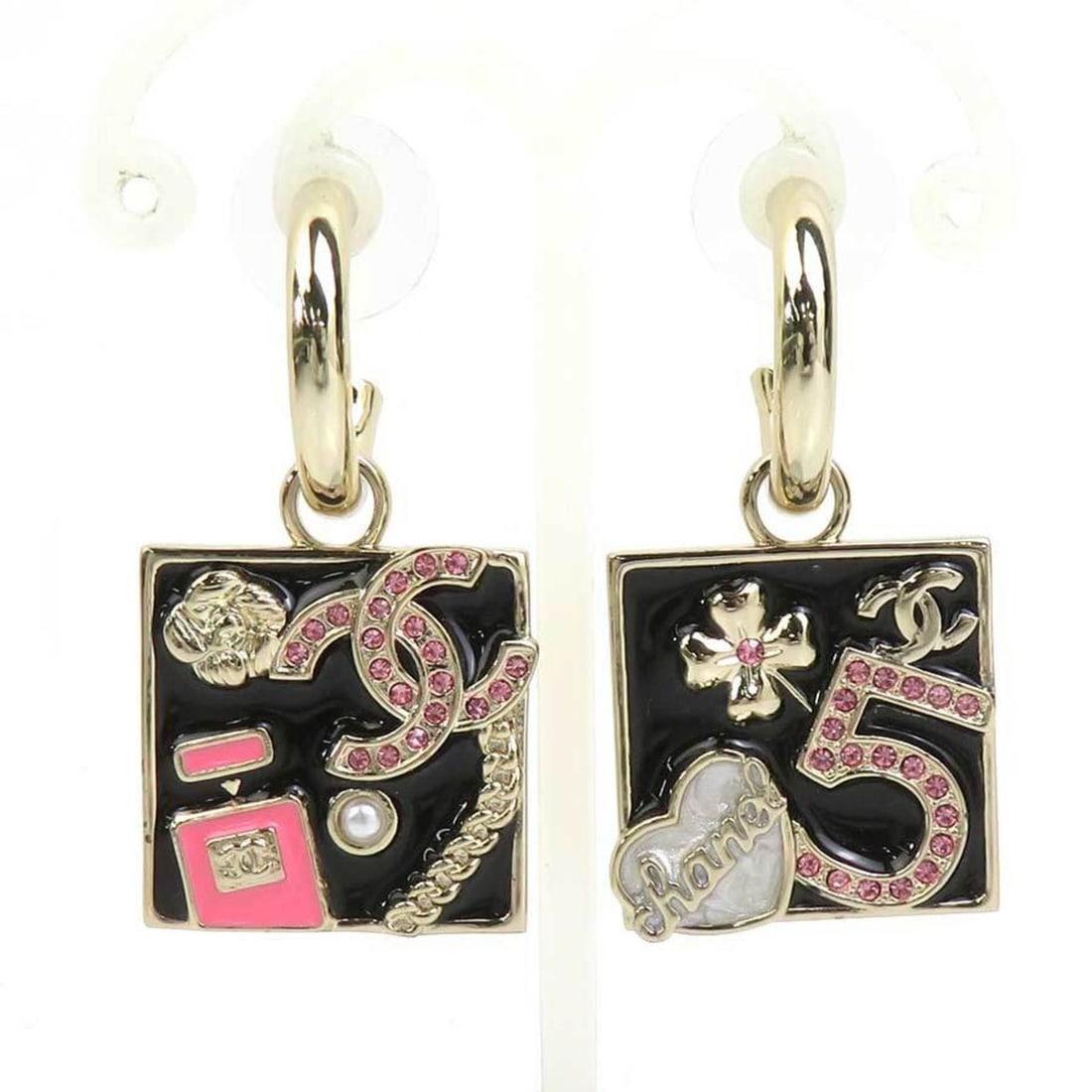 CHANEL Coco Mark Metal Earrings with Rhinestones in Light Gold, Black, and Pink (e61389i): --- Catalog ---Category: SizeSize (HxWxD): 40.00mm x 20.00mm / 1.57'' x 0.79''Category: DesignType: Half hoop earringsColor: Black, Gold, PinkGender: WomenMaterial: Metal, RhinestoneCategory: GeneralB