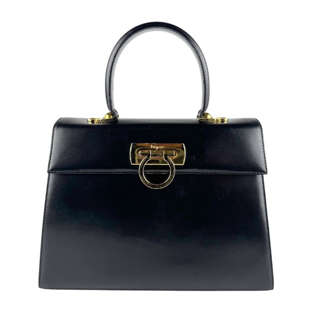 Salvatore Ferragamo Gancini Leather Handbag/Shoulder Bag in Black and Gold for Women (z8452): --- Catalog ---Category: SizeSize (HxWxD): 20cm x 28cm x 10cm / 7.87'' x 11.02'' x 3.93''Category: DesignType: Handbag, Shoulder bagColor: BlackGender: WomenMaterial: Leather Category: GeneralBrand: S