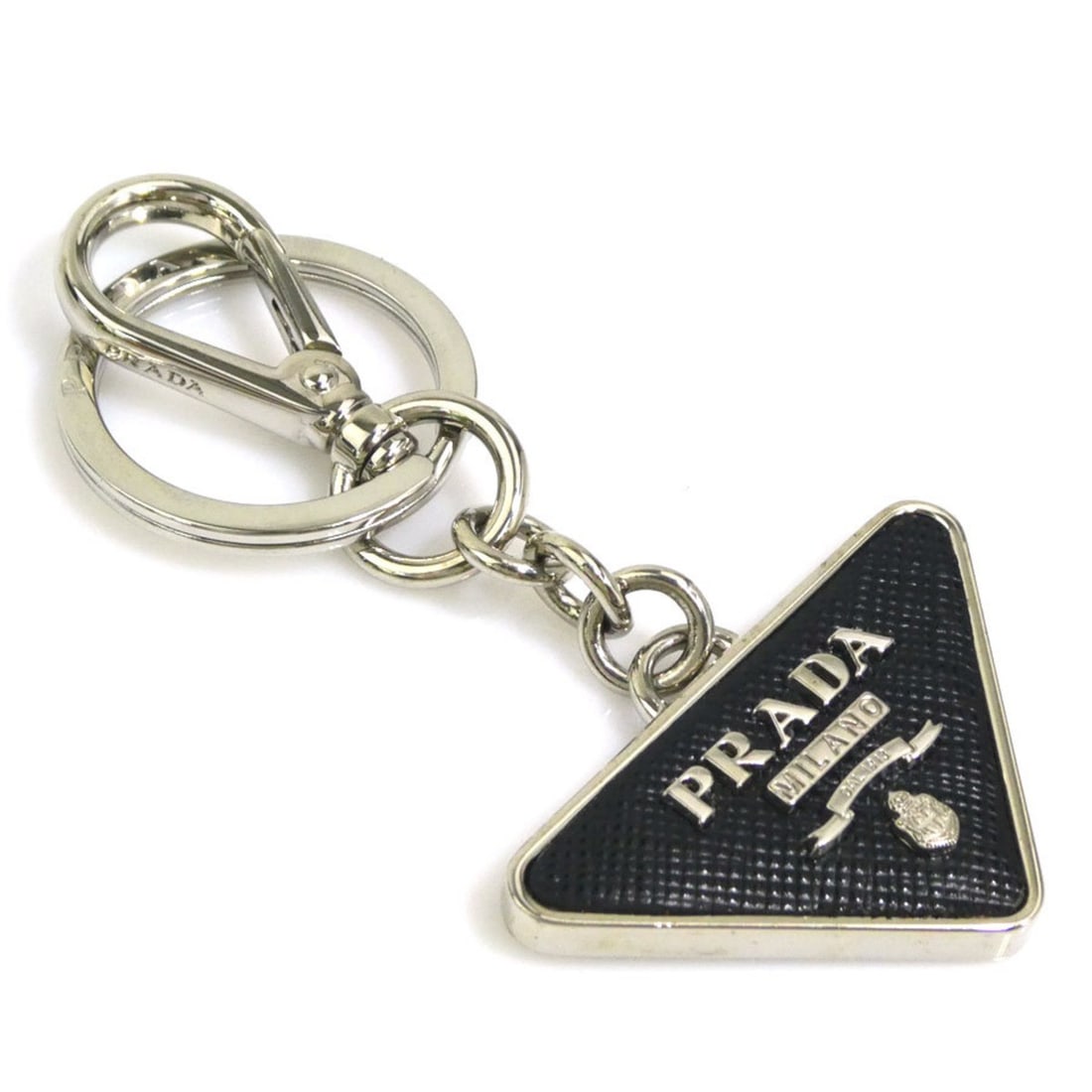 Prada PRADA Key Ring Charm Metal/Leather Silver/Black Unisex e61400k: --- Catalog ---Category: SizeSize (HxWxD): 9cm x 5cm / 3.54'' x 1.96''Category: DesignType: KeyringColor: Black, SilverGender: Men,WomenMaterial: Leather, MetalCategory: GeneralBrand: Prada--- Item Li
