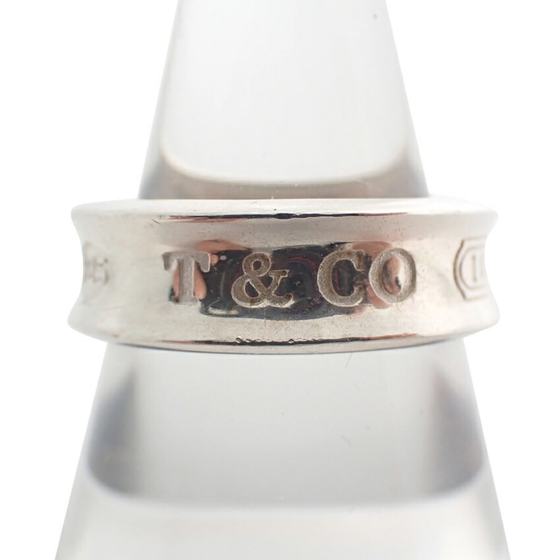 TIFFANY 925 1837 Ring Size 15: --- Catalog ---Category: SizeUS Size: 7.5Brand Size: 55Category: DesignType: Band ringGender: WomenMaterial: Sterling silver 925Category: GeneralBrand: Tiffany--- Item List ---Section: ConditionRankin