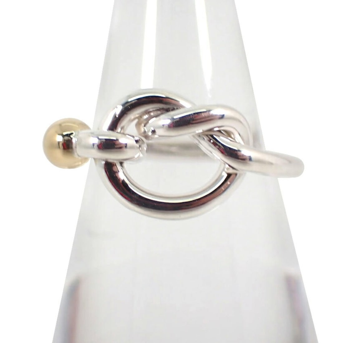 TIFFANY 925 750 Love Knot Ring, size 10: --- Catalog ---Category: SizeUS Size: 5.5Brand Size: 50Category: DesignType: Band ringGender: WomenMaterial: Sterling silver 925, Yellow gold (18K)Category: GeneralBrand: Tiffany--- Item List ---Secti