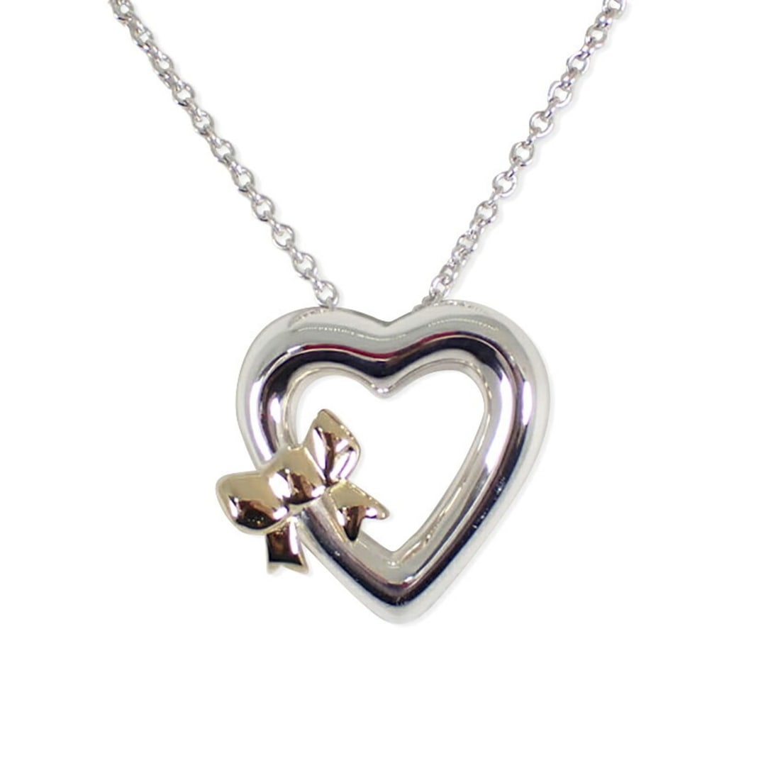 TIFFANY 925 750 Heart Ribbon Pendant Necklace: --- Catalog ---Category: SizePendant Size: 19.1mm x 19.2mm / 0.75'' x 0.75''Neck Circumference: 46 cm / 18.11''Category: DesignGender: WomenMaterial: Sterling silver 925, Yellow gold (18K)Necklace Typ