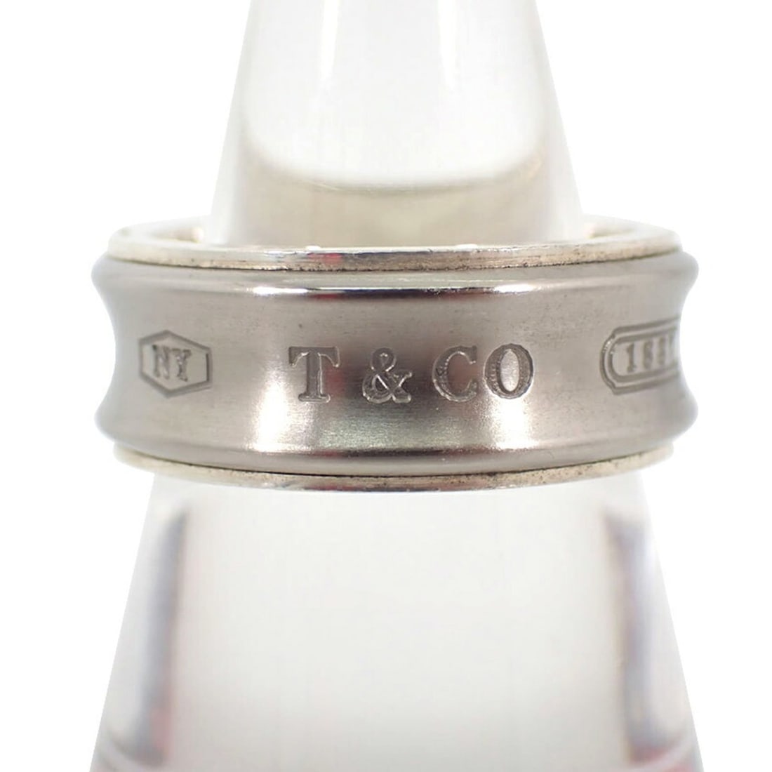 TIFFANY 925 Titanium 1837 Ring Size 16: --- Catalog ---Category: SizeUS Size: 8Brand Size: 56Category: DesignType: Band ringGender: WomenMaterial: Sterling silver 925, TitaniumCategory: GeneralBrand: Tiffany--- Item List ---Section: