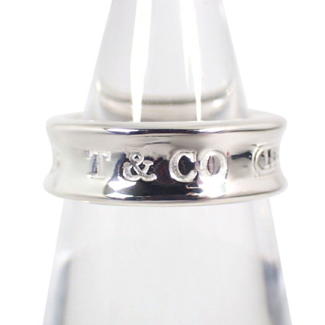 TIFFANY 925 1837 Ring Size 12: --- Catalog ---Category: SizeUS Size: 6.5Brand Size: 52Category: DesignType: Band ringGender: WomenMaterial: Sterling silver 925Category: GeneralBrand: Tiffany--- Item List ---Section: