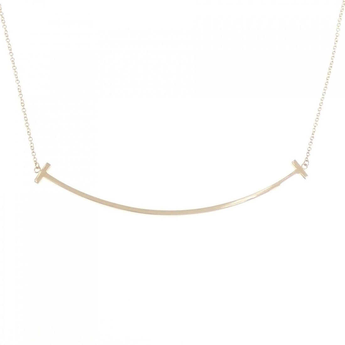 Tiffany T Smile Large Necklace: --- Catalog ---Category: SizePendant Size: 5.9mm x 68.4mm / 0.23'' x 2.69''Neck Circumference: 40 cm - 45 cm / 15.74'' - 17.71''Category: DesignGender: WomenMaterial: Pink gold (18K)Pendant Type: Pend