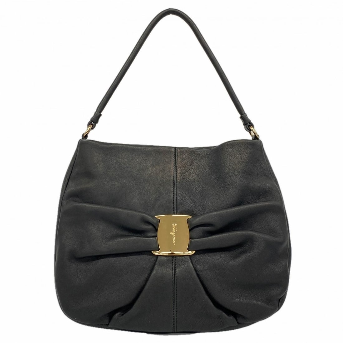 Salvatore Ferragamo Vara Leather Shoulder Bag in Black Champagne for Women: --- Catalog ---Category: SizeSize (HxWxD): 26cm x 32cm x 10cm / 10.23'' x 12.59'' x 3.93''Category: DesignType: Shoulder bagColor: BlackGender: WomenMaterial: Leather Hardware Color: Champagne goldCat