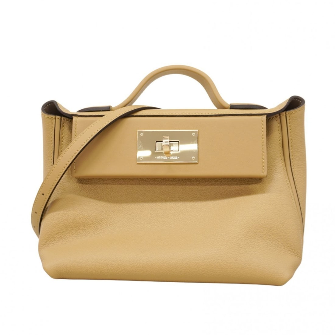 Hermes Hermès Van Quatre Verso handbag in Evercolor, Tabac Camel, Etoupe, and Champagne, with a K: --- Catalog ---Category: SizeSize (HxWxD): 16cm x 20cm x 10.5cm / 6.29'' x 7.87'' x 4.13''Category: DesignType: HandbagColor: Etoupe grayGender: WomenHardware Color: Champagne goldCategory: GeneralBra