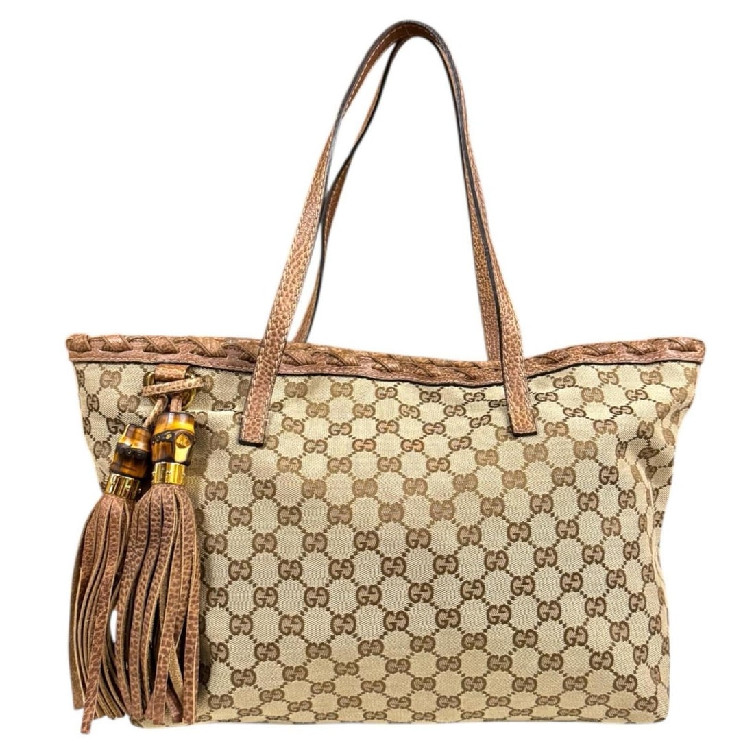Pre-owned Gucci tote bag in GG canvas (218780) brown. Women's.: --- Catalog ---Category: SizeSize (HxWxD): 25.5cm x 44cm x 15cm / 10.03'' x 17.32'' x 5.9''Category: DesignType: Tote bagColor: BrownGender: WomenMaterial: GG canvas Category: GeneralMPN: 218780Brand: