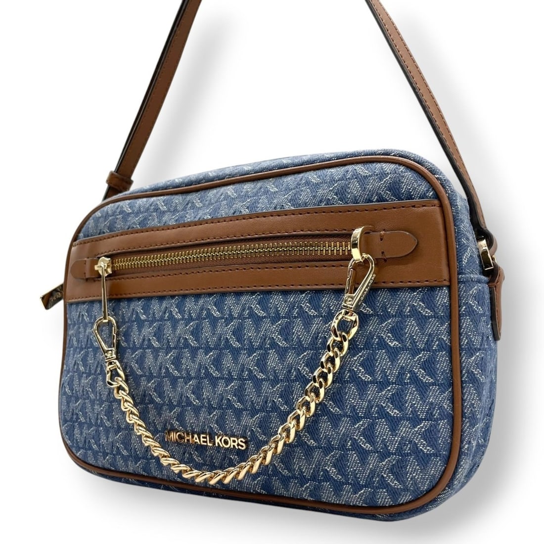Michael Kors shoulder bag, pochette, camera denim-look canvas, leather, blue and brown, gold: --- Catalog ---Category: SizeSize (HxWxD): 16cm x 25cm x 5cm / 6.29'' x 9.84'' x 1.96''Category: DesignType: Pochette, Shoulder bagColor: Blue, BrownGender: WomenMaterial: Canvas , Leather Category: G
