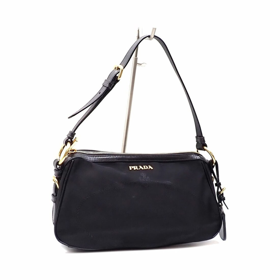 Prada Women's Nero Nylon Leather Bag BR4320 Black: --- Catalog ---Category: SizeSize (HxWxD): 17cm x 31cm x 10cm / 6.69'' x 12.2'' x 3.93''Category: DesignType: Shoulder bagColor: Black, NeroGender: WomenMaterial: Nylon , Leather Category: GeneralMPN: