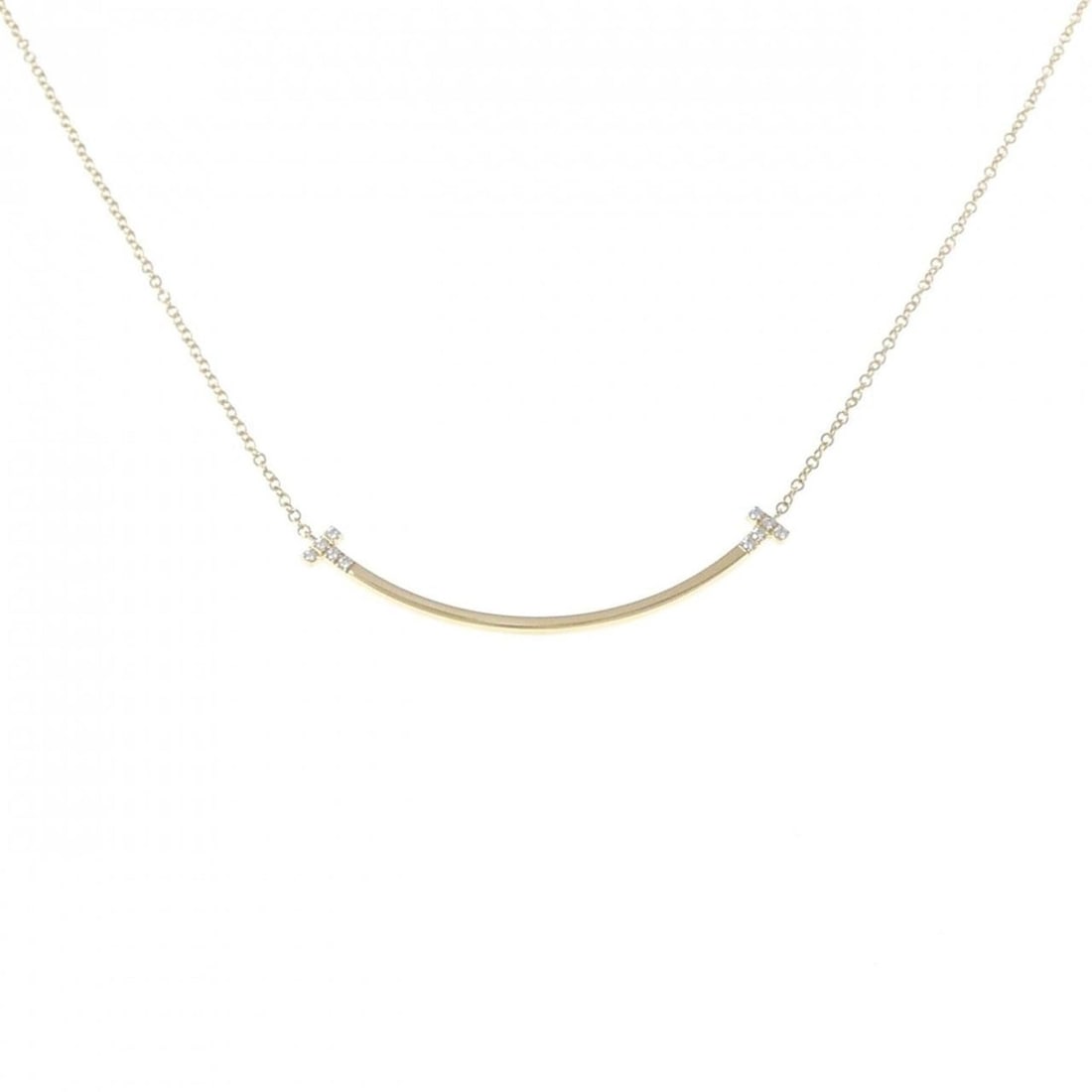 Tiffany T Smile Small Necklace: --- Catalog ---Category: SizeWeight: 2.7g / 0.09oz.Pendant Size: 3.5mm x 36.9mm / 0.13'' x 1.45''Neck Circumference: 40 cm - 45 cm / 15.74'' - 17.71''Category: DesignColor: YellowMetal: GoldStone: