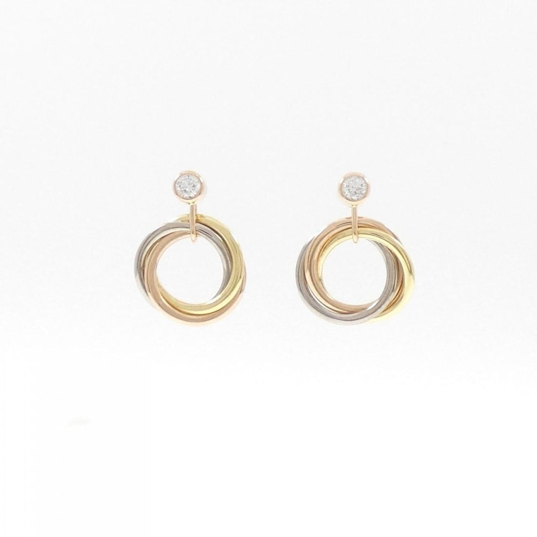 Cartier Trinity Earrings: --- Catalog ---Category: SizeSize (HxWxD): 14.40mm x 9.60mm / 0.57'' x 0.38''Category: DesignColor: Pink, White, YellowGender: WomenMaterial: Pink gold, White gold, Yellow goldCategory: GeneralMPN: