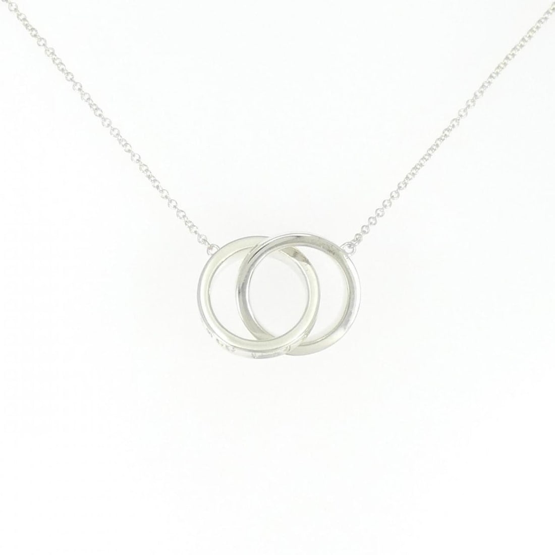 Tiffany 1837 Interlocking Circle Necklace: --- Catalog ---Category: SizeWidth: 1mm / 0.04''Weight: 4.6g / 0.16oz.Pendant Size: 14.3mm / 0.56''Neck Circumference: 45 cm / 17.71''Category: DesignGender: WomenMaterial: Silver 925Necklace Type: