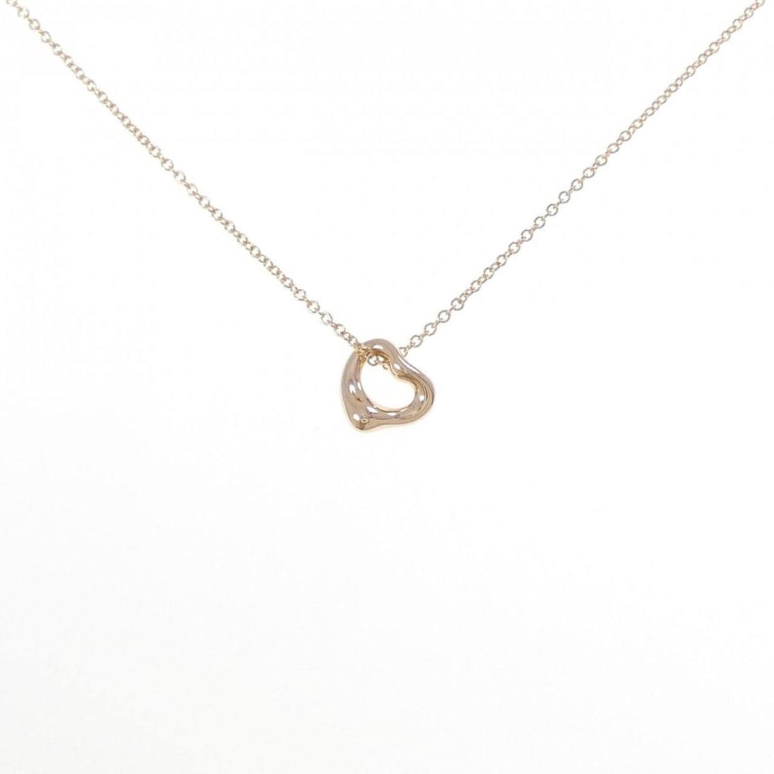 Tiffany Open Heart Necklace: --- Catalog ---Category: SizePendant Size: 6.5mm x 6.5mm / 0.25'' x 0.25''Neck Circumference: 41 cm / 16.14''Category: DesignColor: Pink goldGender: WomenMaterial: Pink gold (18K)Pendant Type: