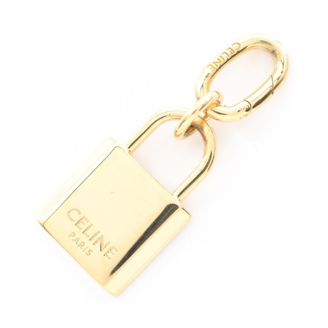 Celine Padlock Charm Accessory GP Women's Gold: --- Catalog ---Category: DesignType: Handbag charmColor: GoldGender: WomenMaterial: Gold platingCategory: GeneralBrand: Celine--- Item List ---Section: ConditionRanking: Rank A Used - A few traces of