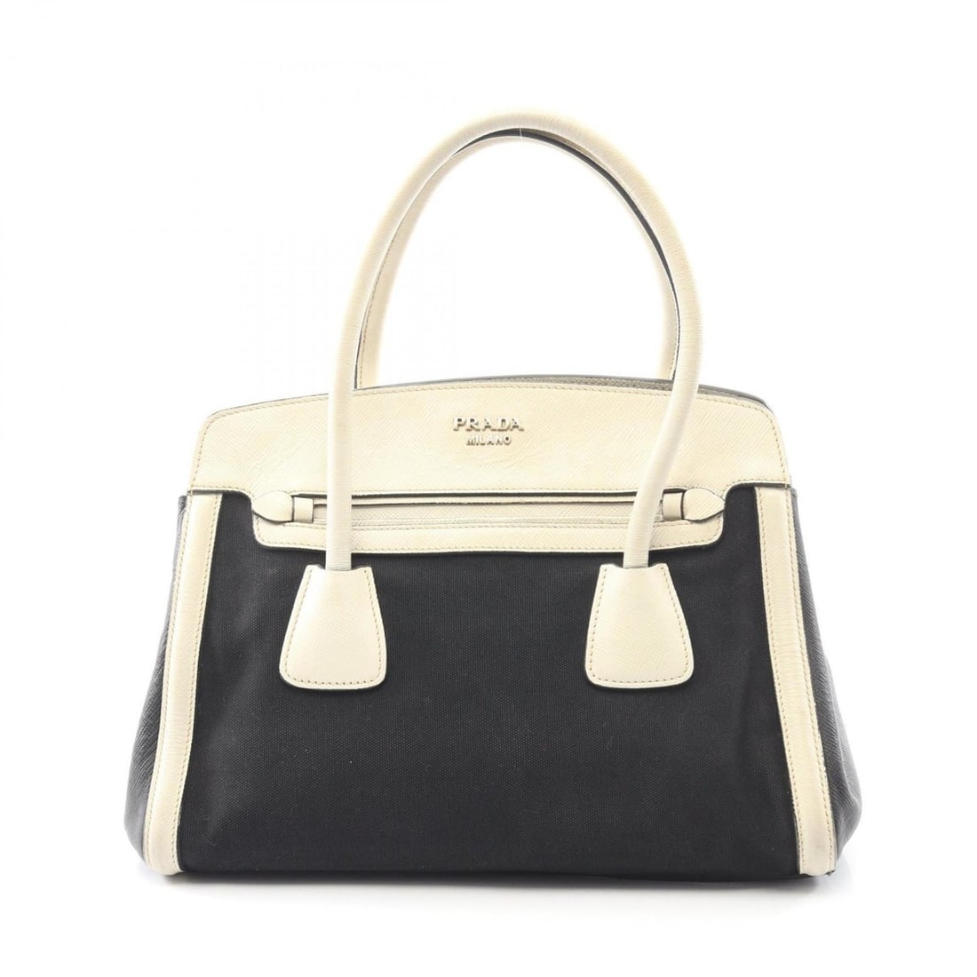 Prada handbag in canvas and Saffiano leather, available black white.: --- Catalog ---Category: SizeSize (HxWxD): 25cm x 33cm x 16cm / 9.84'' x 12.99'' x 6.29''Category: DesignType: HandbagColor: Black, WhiteGender: WomenMaterial: Canvas , Saffiano Category: GeneralBrand