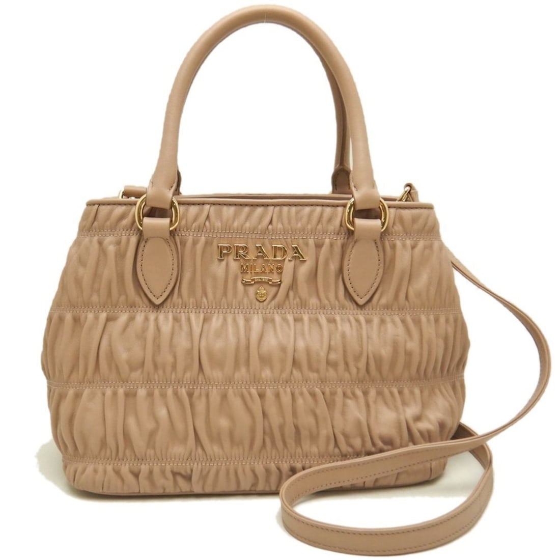 PRADA 1BA172 2-Way Pleated Handbag in Pink Beige Leather, Women's, 253553: --- Catalog ---Category: SizeSize (HxWxD): 19cm x 25cm x 13cm / 7.48'' x 9.84'' x 5.11''Strap Length: 118cm - 128cm / 46.45'' - 50.39''Category: DesignType: HandbagColor: Pink beigeGender: WomenClosur