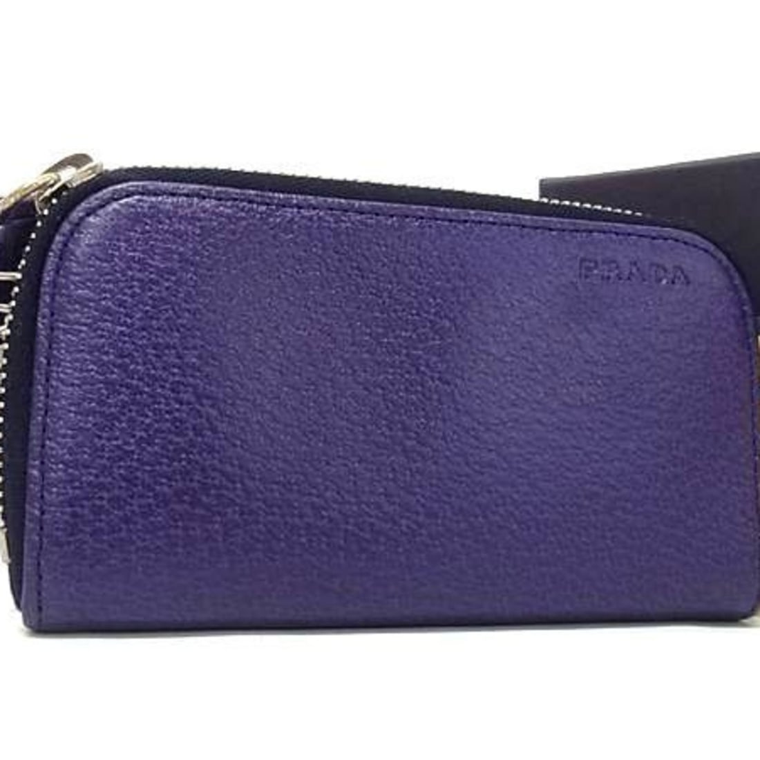PRADA Prada Key Case 1M0604 Purple Leather Round 6-Ring Keychain for Men and Women: --- Catalog ---Category: DesignType: KeycaseColor: PurpleGender: Men,Women,UnisexMaterial: Leather Number of Key Hooks: 6Category: GeneralBrand: PradaCountry of Origin: ItalyCategory: Physical Propert