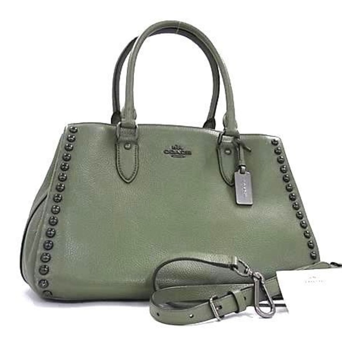 COACH Rivet Empire Carryall Handbag 36399 Khaki Leather Women's: --- Catalog ---Category: SizeSize (HxWxD): 23.5cm x 31.5cm x 14cm / 9.25'' x 12.4'' x 5.51''Category: DesignType: Handbag, Shoulder bag, Tote bagColor: KhakiGender: WomenClosure: MagnetMaterial: Leath