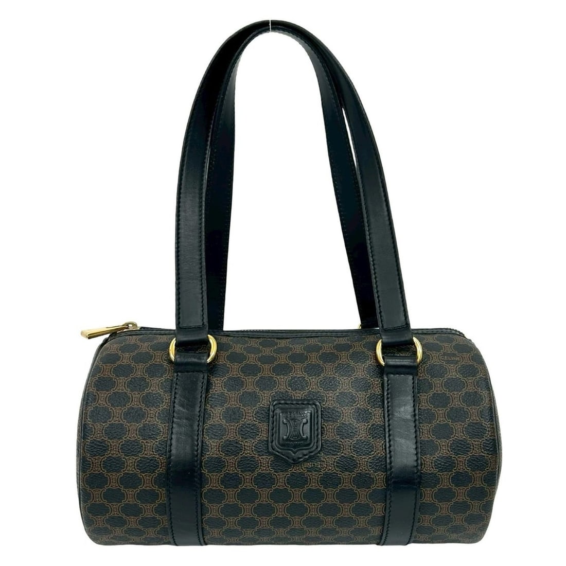 CELINE Macadam Triomphe Leather Handbag/Boston Bag/Semi-Shoulder Bag in Brown and Black (689-3): --- Catalog ---Category: SizeSize (HxWxD): 13.5cm x 25cm x 13.5cm / 5.31'' x 9.84'' x 5.31''Category: DesignType: Boston bag, Handbag, Shoulder bagColor: Black, BrownGender: WomenMaterial: Leather , P