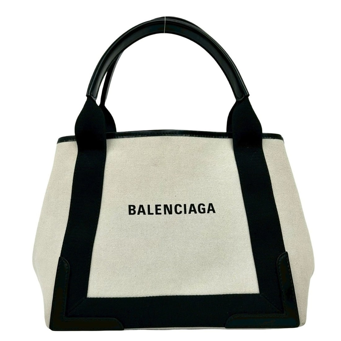 BALENCIAGA Navy Cabas S Logo Canvas and Leather Tote Bag, Ivory Black, 28716: --- Catalog ---Category: SizeSize (HxWxD): 22.5cm x 29.5cm x 17cm / 8.85'' x 11.61'' x 6.69''Category: DesignType: Handbag, Pouch, Tote bagColor: Black, IvoryGender: WomenMaterial: Canvas , Leather Ca
