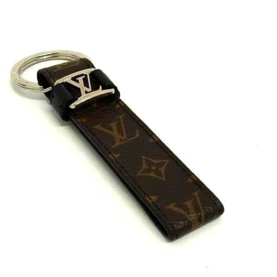 LOUIS VUITTON Louis Vuitton Keychain LV Dragonne M62709 Brown Monogram Men's Women's 16600: --- Catalog ---Category: DesignType: KeyringColor: BrownStyle: FashionGender: Men,Women,UnisexMaterial: MonogramCategory: GeneralLine: MonogramBrand: Louis Vuitton--- Item List ---Section: ConditionRa