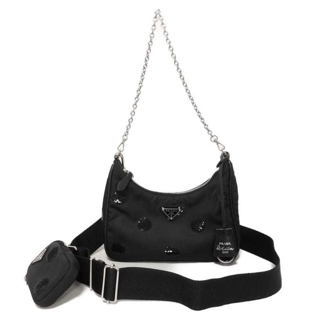 Prada Re-Edition 2005 Re-Nylon Polka Dot Shoulder Bag with Sequin Chain and Triangle Pattern, Black,: --- Catalog ---Category: SizeSize (HxWxD): 11.5cm x 22cm x 6cm / 4.52'' x 8.66'' x 2.36''Category: DesignType: Pouch, Shoulder bagColor: BlackGender: WomenMaterial: Nylon , Fabric Category: GeneralMPN