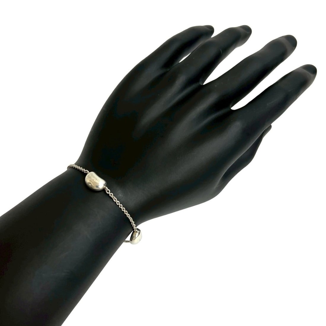 TIFFANY & Co. Tiffany Bean Sterling Silver 925 Chain Bracelet, 1526e: --- Catalog ---Category: SizeLength: 18cm / 7.08''Category: DesignType: Charm braceletColor: SilverGender: WomenMaterial: Silver 925Category: GeneralBrand: Tiffany--- Item List ---Section: ConditionRa
