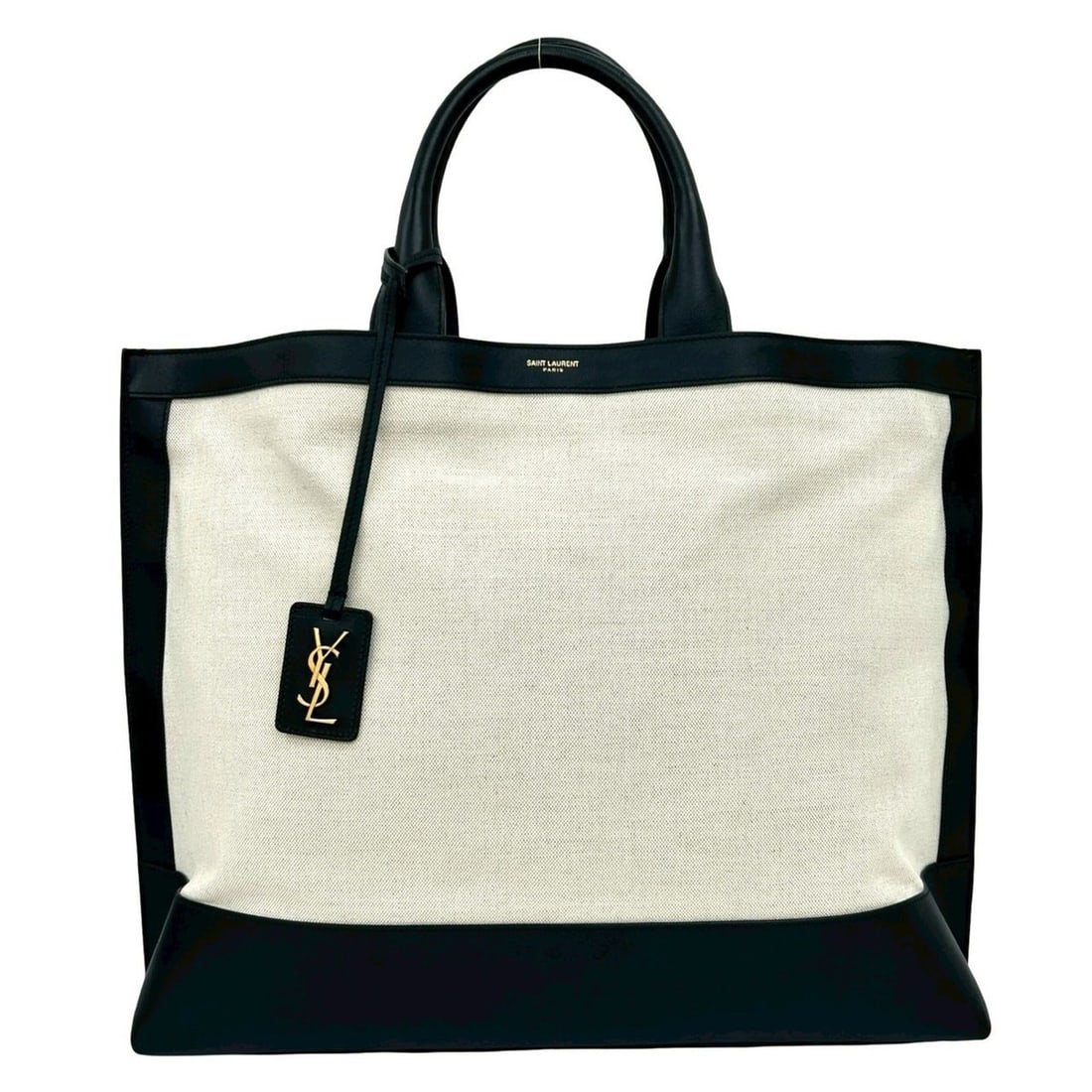 Yves Saint Laurent SAINT LAURENT PARIS Sac Shopping YSL Leather Canvas Tote Bag in Black and Natural: --- Catalog ---Category: SizeSize (HxWxD): 36cm x 41cm x 13cm / 14.17'' x 16.14'' x 5.11''Category: DesignType: Tote bagColor: Black, WhiteGender: WomenMaterial: Leather , Canvas Category: GeneralBran