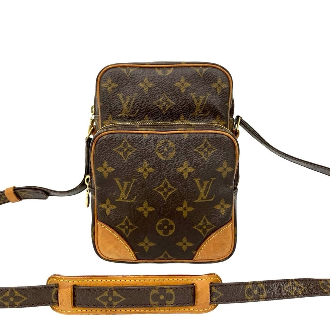 LOUIS VUITTON Amazon Monogram Leather Mini Shoulder Bag/Pochette in Brown 56079: --- Catalog ---Category: SizeSize (HxWxD): 21cm x 15cm x 5cm / 8.26'' x 5.9'' x 1.96''Category: DesignType: Pochette, Shoulder bagColor: BrownGender: WomenMaterial: Leather , PVC Category: GeneralBran