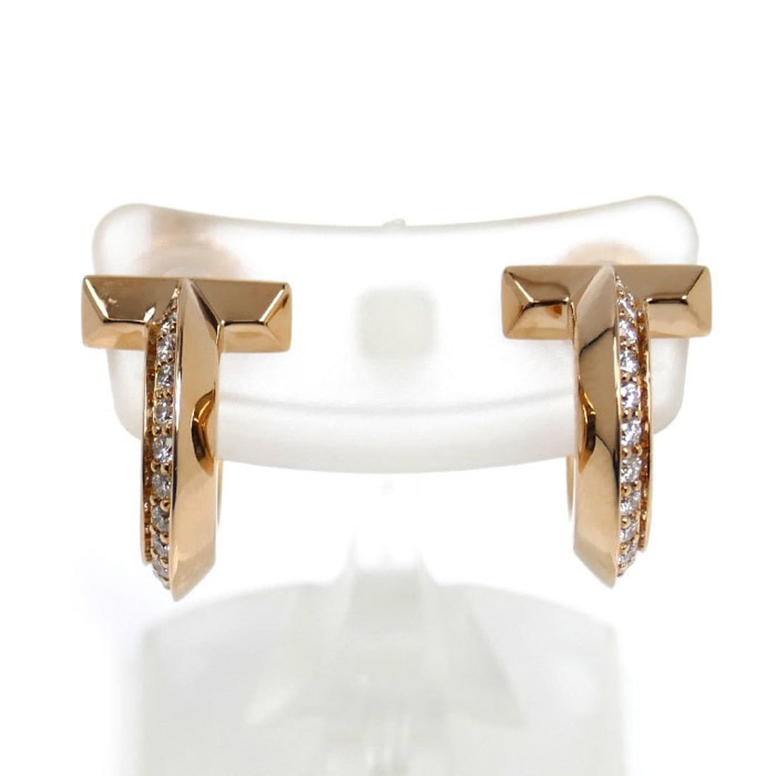 TIFFANY & Co. Tiffany 18KPG Pink Gold T-One Hoop Earrings 69782981 with 0.20ct/0.20ct Diamonds,: --- Catalog ---Category: SizeSize (HxWxD): 14.30mm x 9.20mm / 0.56'' x 0.36''Category: DesignType: Hoop earringsGender: WomenMaterial: Pink gold (18K)Category: GeneralMPN: 69782981Brand: Tiffany--- It