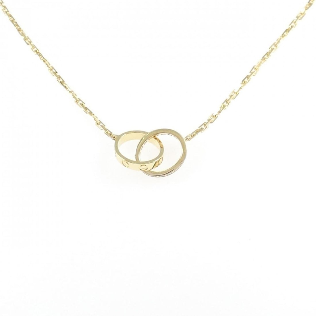 Cartier Baby Love Necklace: --- Catalog ---Category: SizePendant Size: 9.6mm x 9.6mm / 0.37'' x 0.37''Neck Circumference: 43 cm / 16.92''Category: DesignColor: Yellow goldStone: DiamondGender: WomenMaterial: Yellow gold (18K)Nec