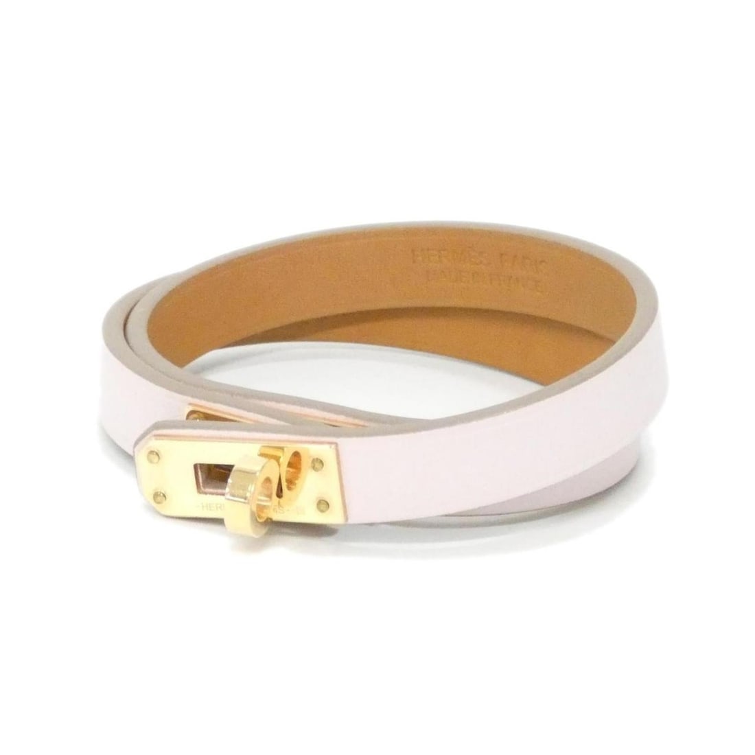 Hermes Hermès Mini Kelly Double Tour 081182CD Bracelet: --- Catalog ---Category: SizeLength: 15cm / 5.9''Category: DesignType: Charm braceletColor: Light pinkGender: WomenMaterial: Swift leatherCategory: GeneralMPN: 081182CDBrand: Hermes--- Item List ---Se