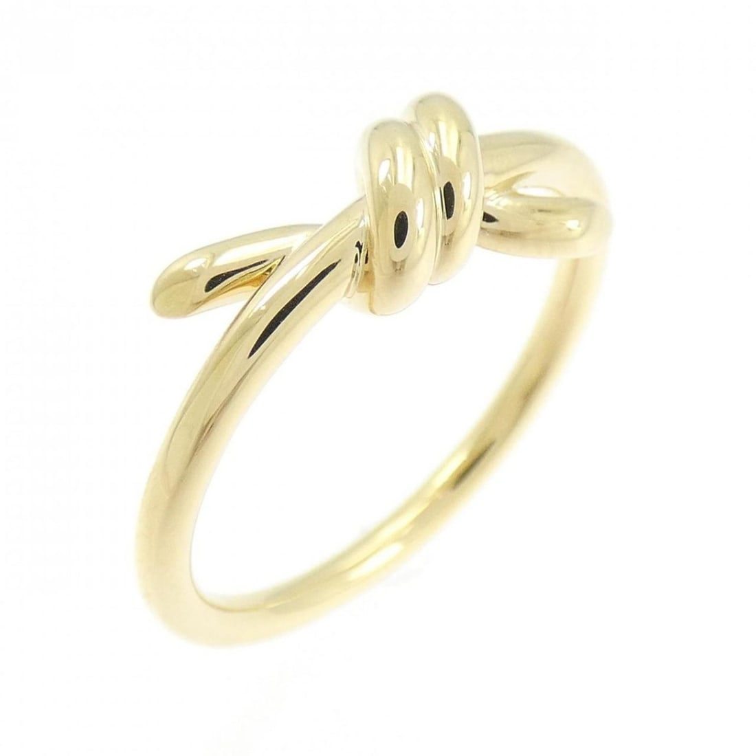 Tiffany Knot Ring: --- Catalog ---Category: SizeJP Size: 12US Size: 6.5Category: DesignType: Band ringColor: Yellow goldGender: WomenMaterial: Yellow gold (18K)Category: GeneralBrand: Tiffany--- Item List ---Section: