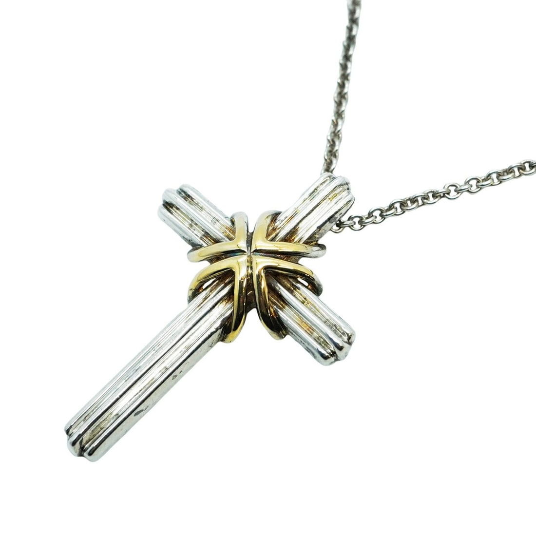 Tiffany Signature Cross Necklace in 18K Yellow Gold and 925 Silver for Women: --- Catalog ---Category: SizePendant Size: 33.2mm x 22.2mm / 1.3'' x 0.87''Neck Circumference: 46.5 cm / 18.3''Category: DesignGender: WomenMaterial: Silver 925, Yellow gold (18K)Necklace Type: Neckla