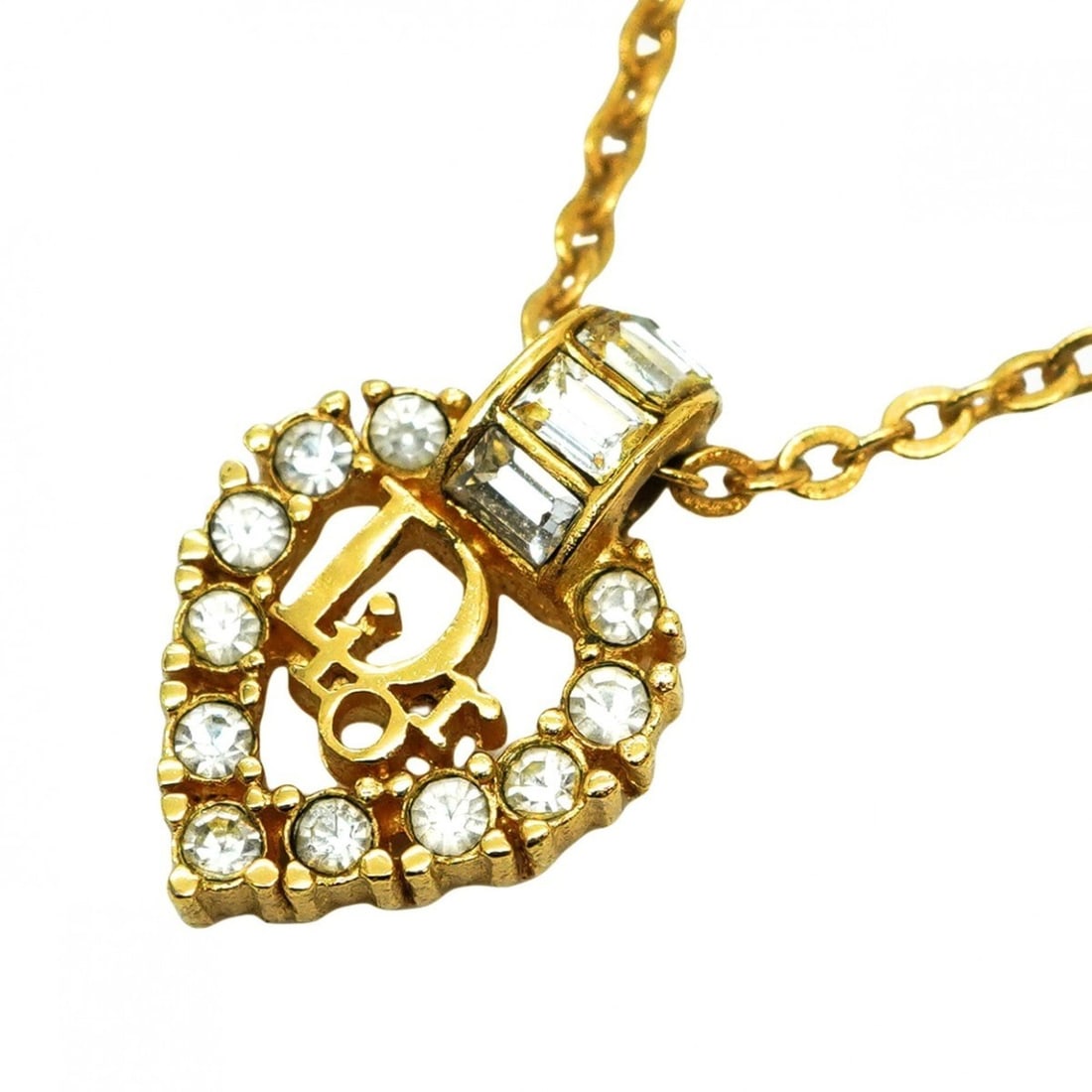 Christian Dior necklace with heart motif, gold plated rhinestones, for women.: --- Catalog ---Category: SizePendant Size: 18.4mm x 12.9mm / 0.72'' x 0.5''Neck Circumference: 39 cm - 44 cm / 15.35'' - 17.32''Category: DesignColor: GoldGender: WomenMaterial: Gold plating, Rhinesto