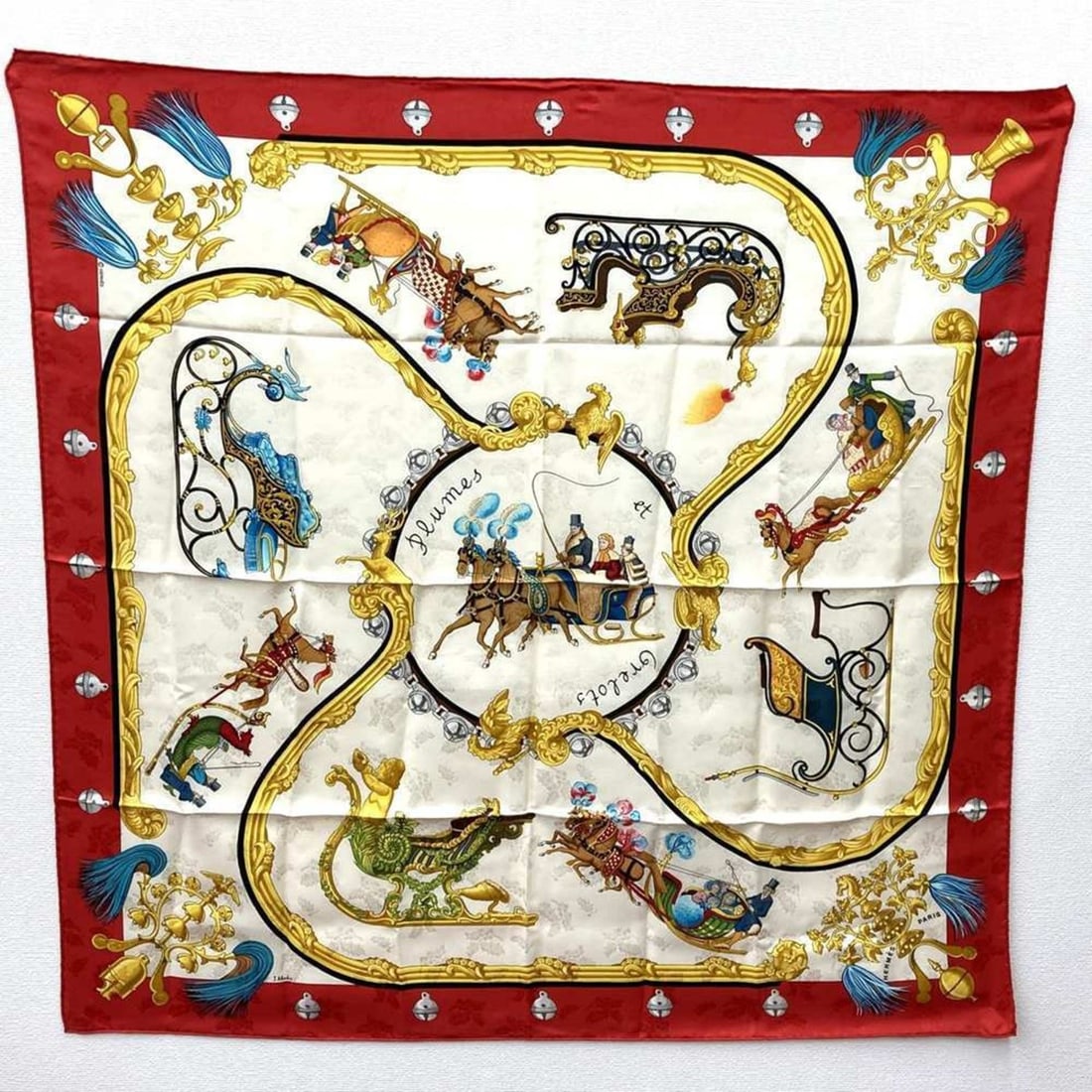 HERMES Carré 90 "Plumes et Grelots" Feather and Bell Scarf, Silk, Red, Women's: --- Catalog ---Category: SizeWeight: 64g / 2.25oz.Size (LxW): 84cm x 88cm / 33.07'' x 34.64''Category: DesignType: ScarfColor: Red colorGender: WomenMaterial: Silk Category: GeneralBrand: Hermes--- It
