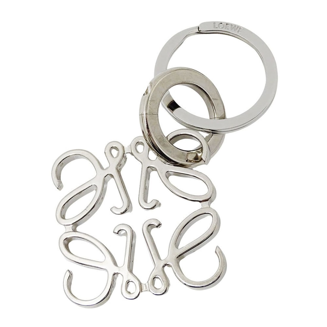 LOEWE Key Ring, Women's and Men's, Brand Metal Silver Bag Charm, Logo: --- Catalog ---Category: SizeSize (HxWxD): 8cm x 5cm x 5.00mm / 3.14'' x 1.96'' x 0.19''Category: DesignType: KeyringColor: SilverGender: Men,WomenMaterial: MetalCategory: GeneralBrand: Loewe--- Item