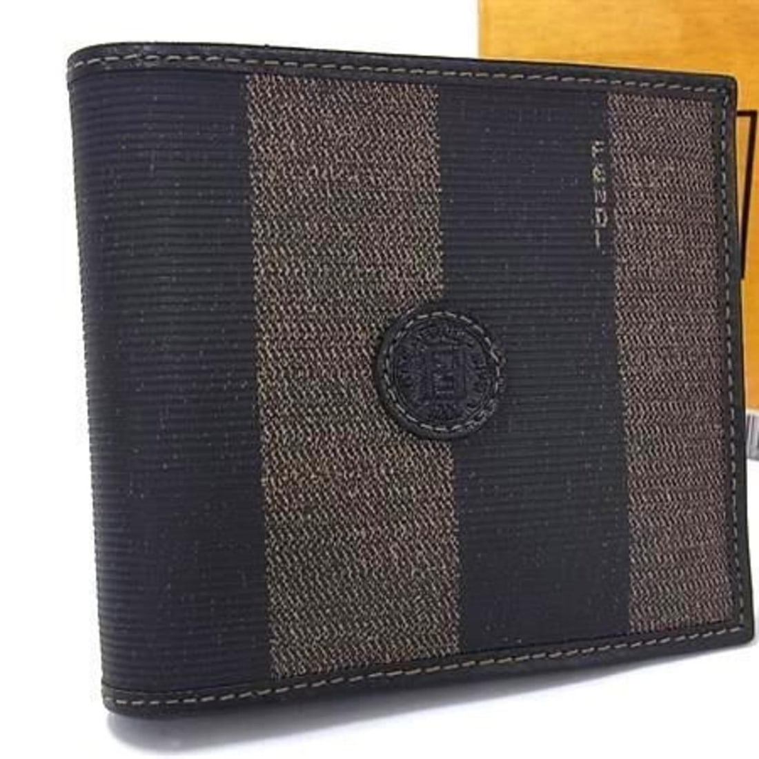 FENDI Pecan Wallet 2251 01445 068 Khaki Leather Men's Bifold: --- Catalog ---Category: SizeSize (HxWxD): 9.5cm x 10.5cm x 1cm / 3.74'' x 4.13'' x 0.39''Category: DesignType: Wallet (bi-fold)Color: KhakiGender: Men,WomenMaterial: PVC , Leather Category: GeneralMP