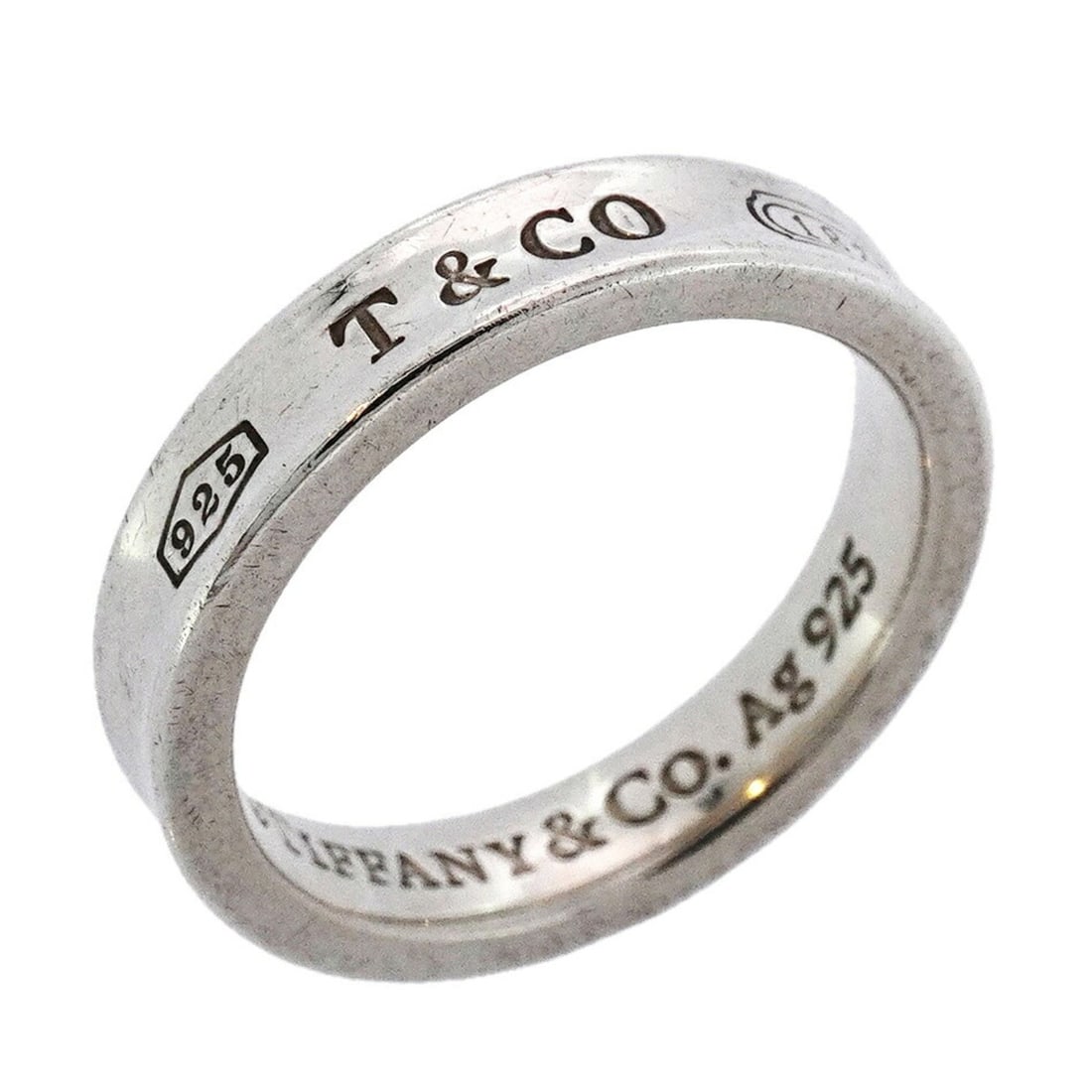 Tiffany narrow ring, silver 925, size 10, women's: --- Catalog ---Category: SizeJP Size: 10US Size: 5.5Category: DesignType: Band ringGender: WomenMaterial: Silver 925Category: GeneralBrand: Tiffany--- Item List ---Section: ConditionRanking: Rank AB U