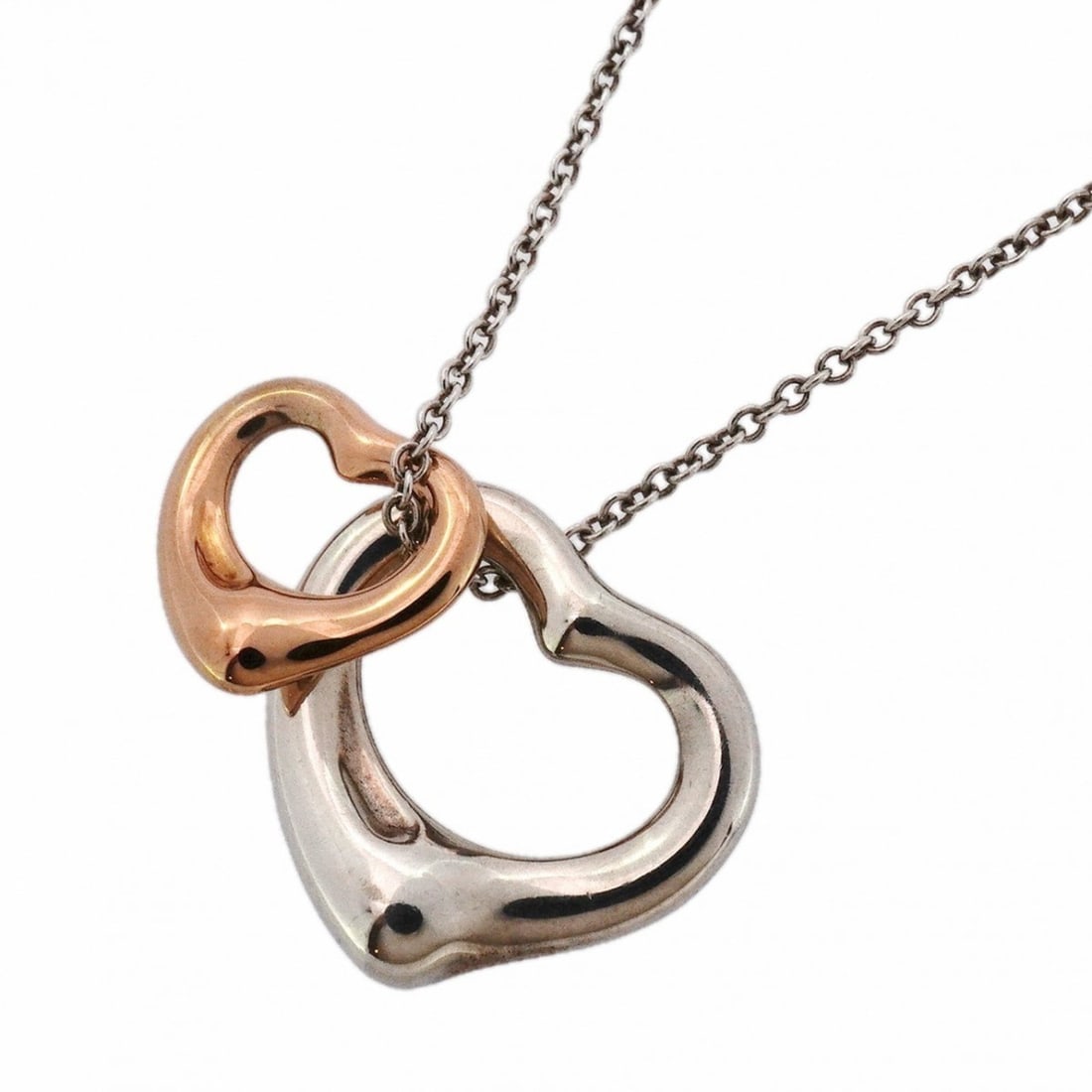 Tiffany Double Heart Necklace in 18KPG Pink Gold and 925 Silver for Women: --- Catalog ---Category: SizePendant Size: 14.4mm x 16mm / 0.56'' x 0.62''Neck Circumference: 40.5 cm / 15.94''Category: DesignGender: WomenMaterial: Pink gold (18K), Silver 925Necklace Type: Necklace