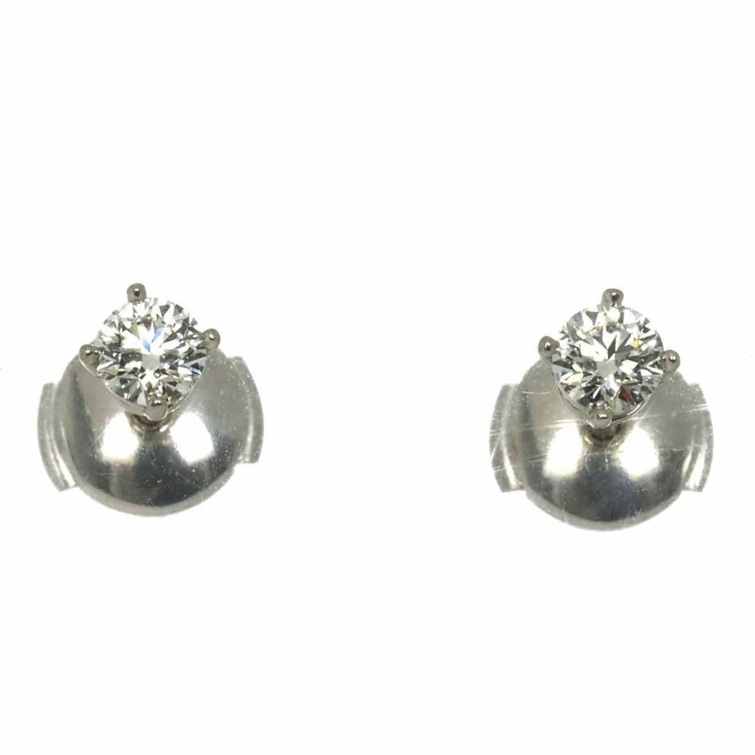 Tiffany & Co. Solitaire Diamond Earrings, Platinum Studs: --- Catalog ---Category: SizeSize (HxWxD): 3.90mm x 3.90mm / 0.15'' x 0.15''Category: DesignType: Stud earringsGender: WomenMaterial: Platinum 950Category: GeneralBrand: Tiffany--- Item List ---Sectio