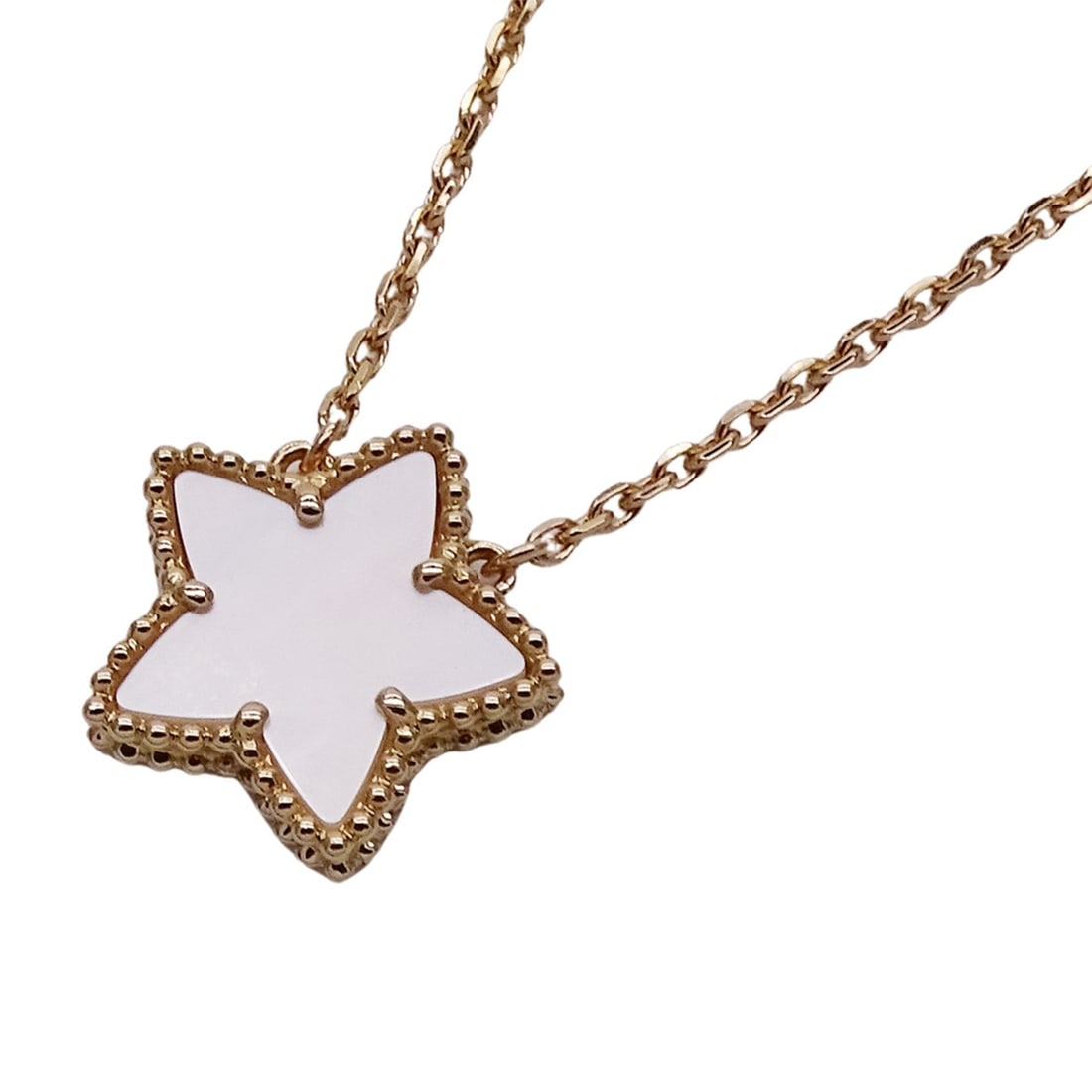 Van Cleef & Arpels Lucky Alhambra Star Necklace for Women, 750YG Mother-of-Pearl Yellow Gold,: --- Catalog ---Category: SizePendant Size: 13.8mm x 14.5mm / 0.54'' x 0.57''Neck Circumference: 37.5 cm - 42 cm / 14.76'' - 16.53''Category: DesignColor: Yellow goldGender: WomenMaterial: Yellow gold